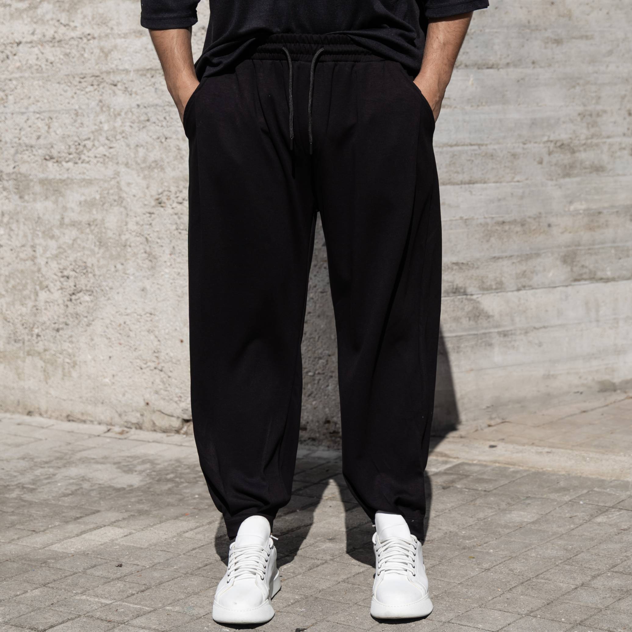 Νέο έργο - 2026-02-18T143310.114 Φόρμα μαύρη με λάστιχο scratch σε oversized γραμμή - Image 1